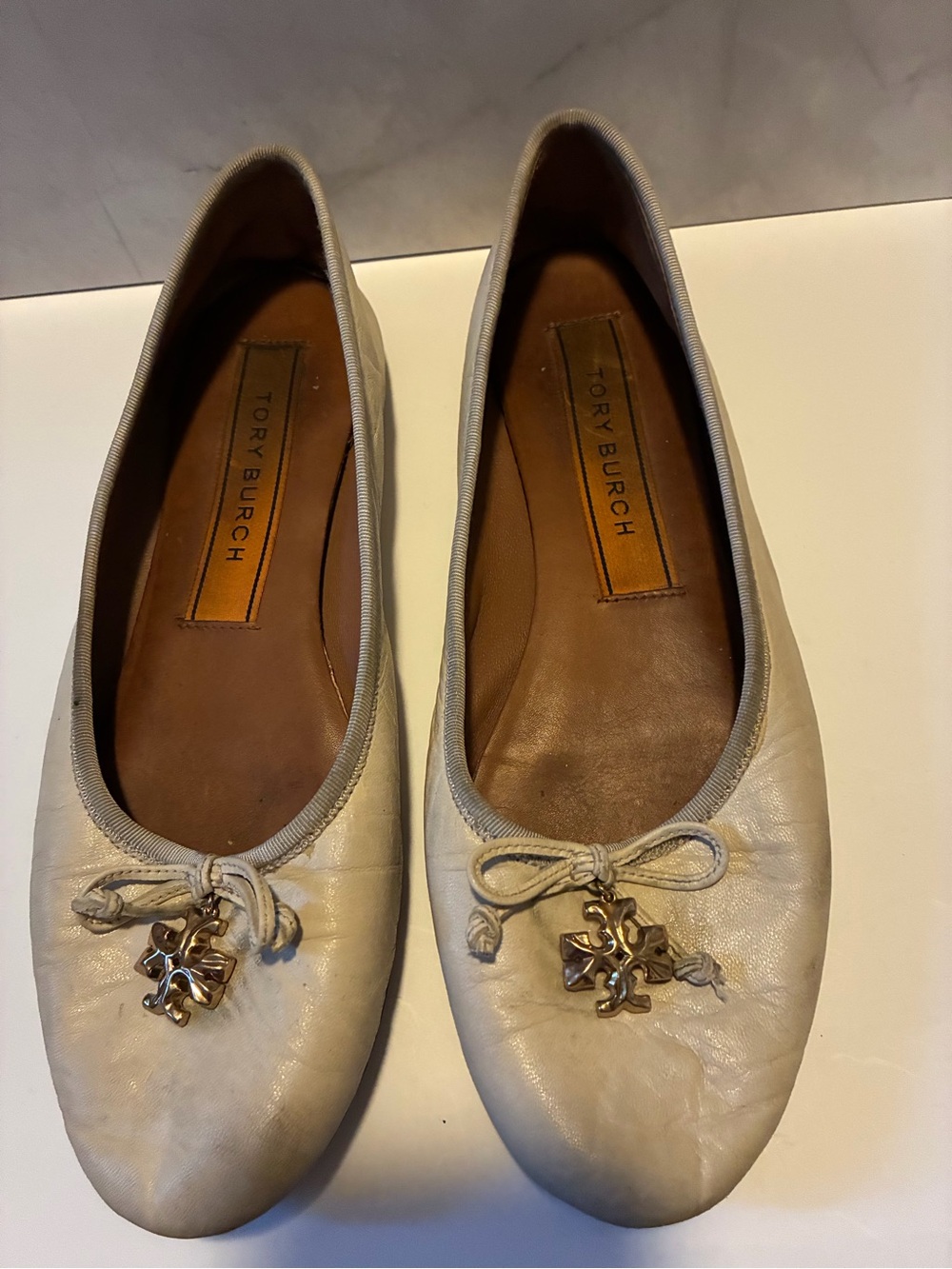 Tory Burch Ivory Leather Ballet Flats with Gold Logo Charm